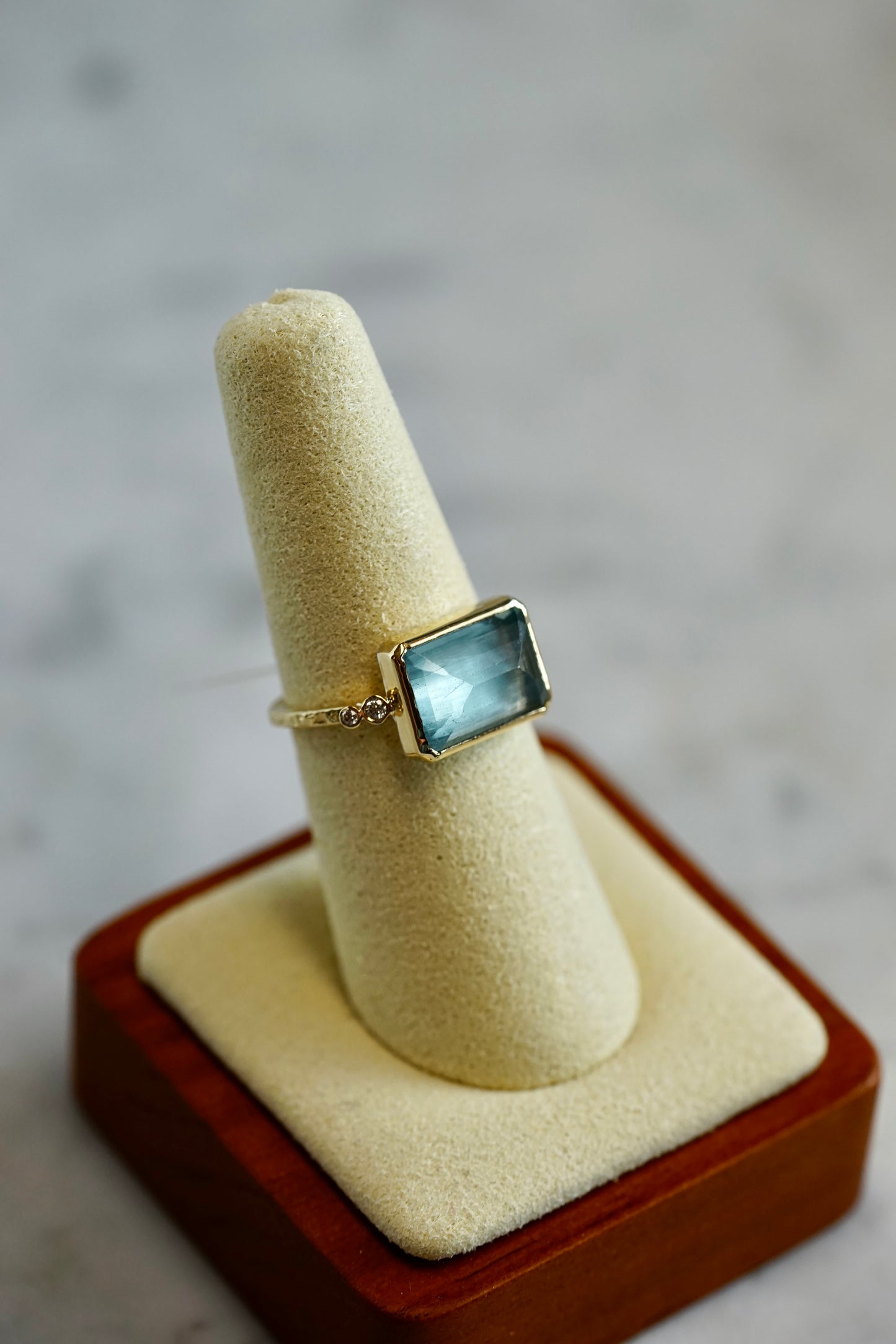 Emerald Cut Aqua Ring with 14k textured band and bezel