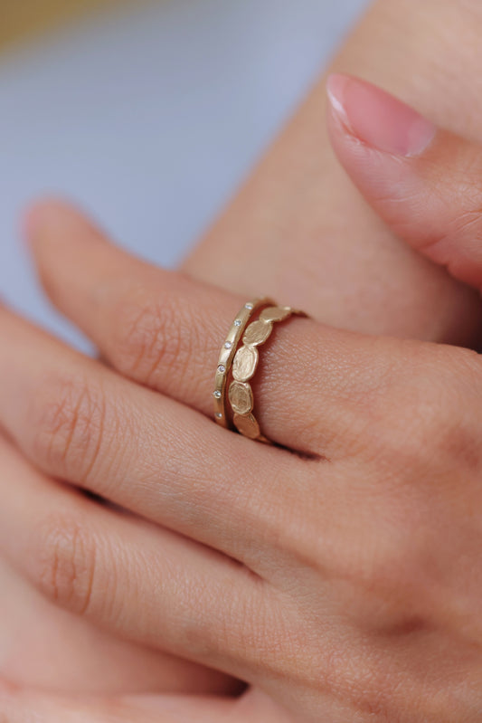 Victoria Cunningham - Rough band with 7 burnished diamonds ring