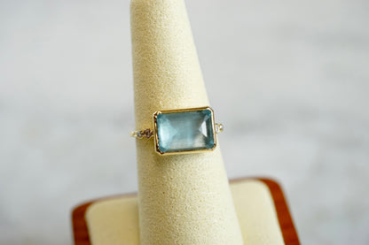 Emerald Cut Aqua Ring with 14k textured band and bezel