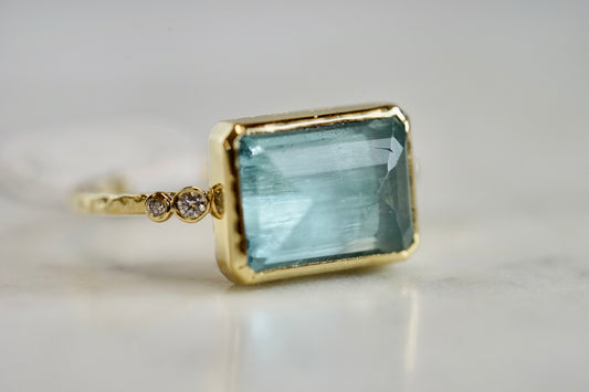 Emerald Cut Aqua Ring with 14k textured band and bezel