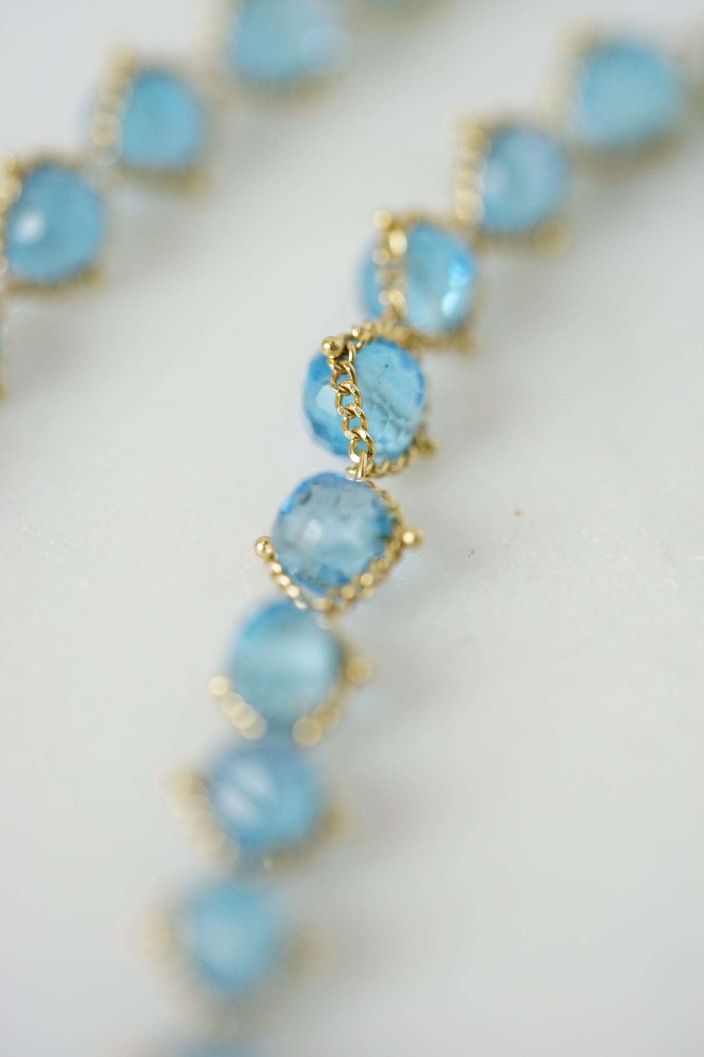 Amali - Woven London Blue Topaz in 18k gold 16-18"