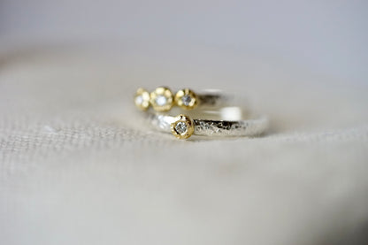 18ky bezel Ring .03ct diamond with sterling silver band - size 6.5