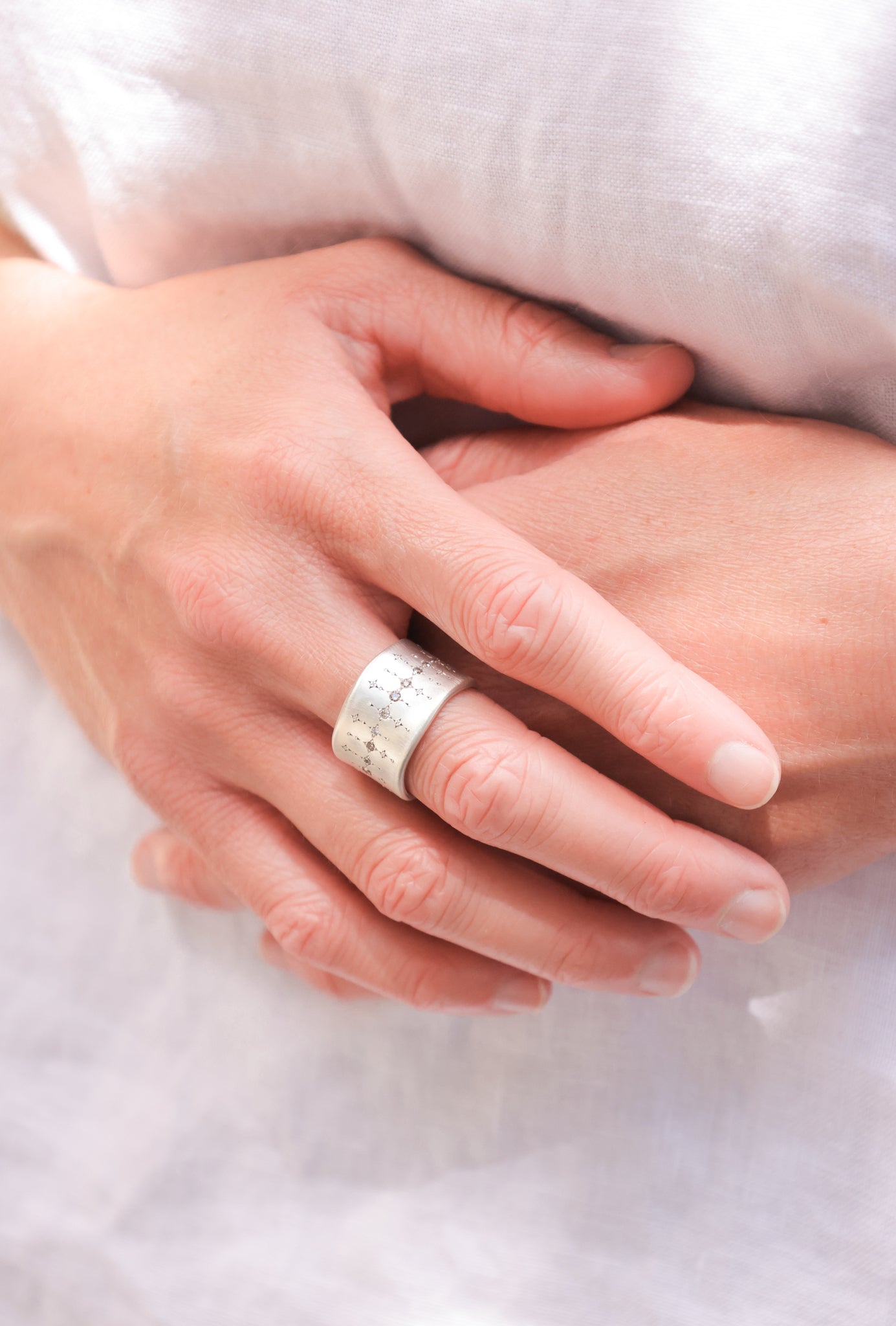 Adel Chefridi - Single organic wide sterling band with Champagne Diamonds