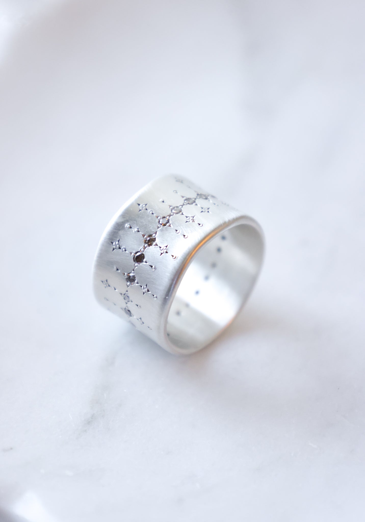 Adel Chefridi - Single organic wide sterling band with Champagne Diamonds