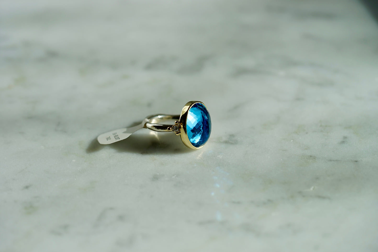 10.45ct London Blue Topaz ring with diamonds in 14k bezel and sterling band - size 7