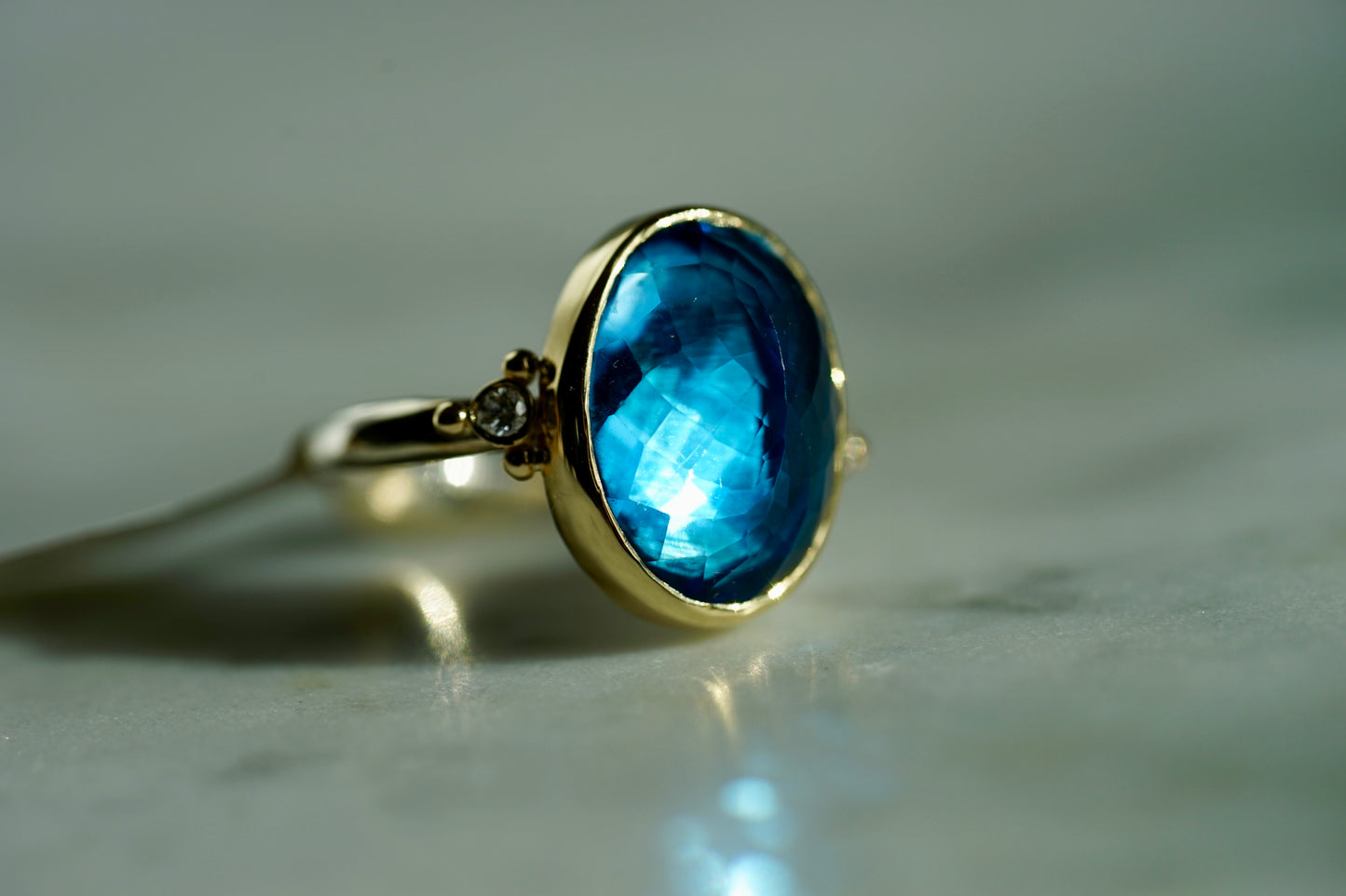 10.45ct London Blue Topaz ring with diamonds in 14k bezel and sterling band - size 7