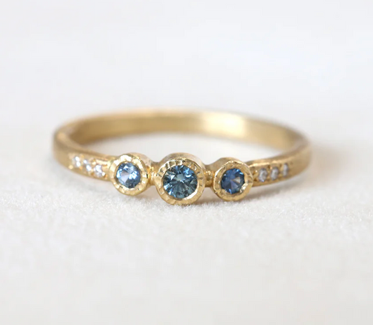 3 bezel 18ky Ring - 0.17ct Montana Blue Sapphire with 0.03ct diamond - size 6.5