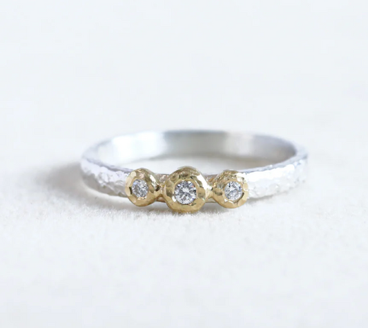 18ky 3-bezel Ring 0.07ct diamond with sterling silver band - size 5.5