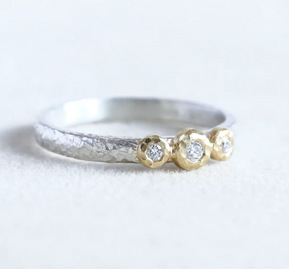 18ky 3-bezel Ring 0.07ct diamond with sterling silver band - size 5.5